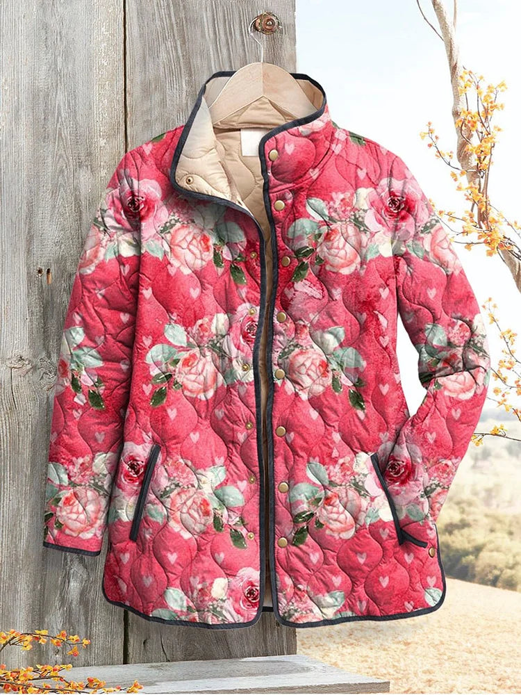 Catherine quilted jacket in pink rose print, front view with stand collar