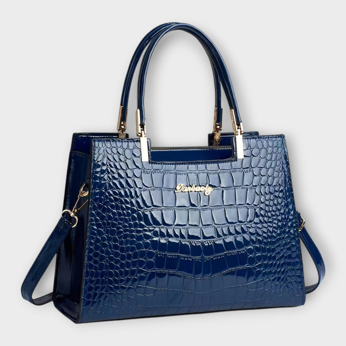 Maison Verdelle croc-effect handbag in navy blue, front three-quarter view