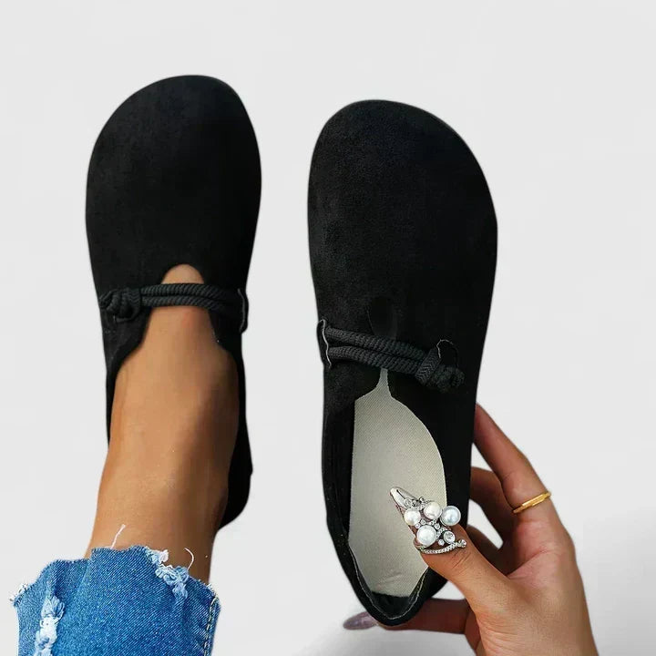 Margot loafers in black, close-up of knotted cord detail