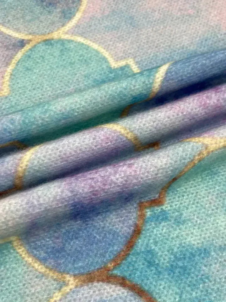 Selah sweater knit texture with golden mosaic outlines close-up