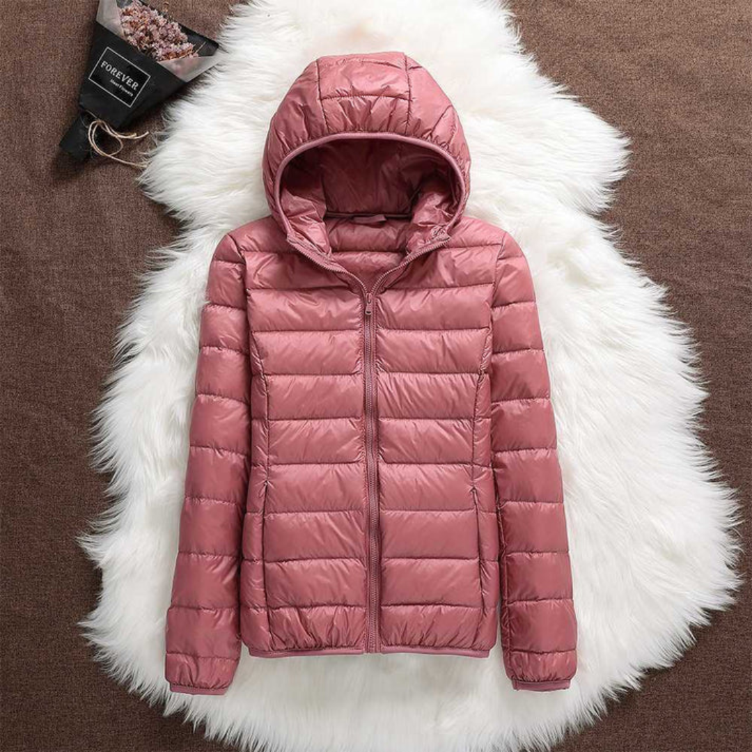 Metta padded jacket in salmon laid flat, showing hood and zip