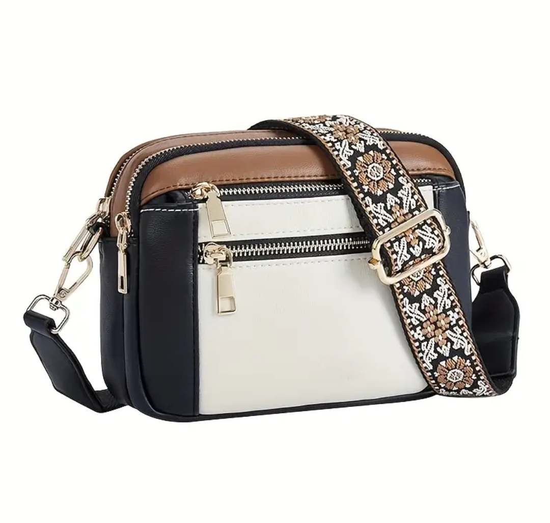 Strap crossbody bag in black and white with woven strap