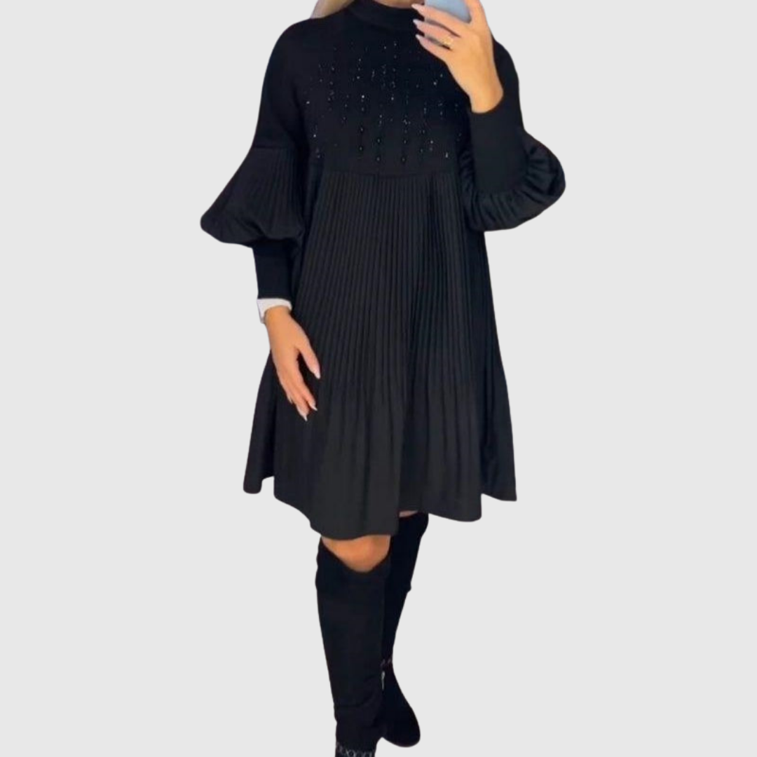 Elodie pleated puff-sleeve gown in black, front view of beaded bodice
