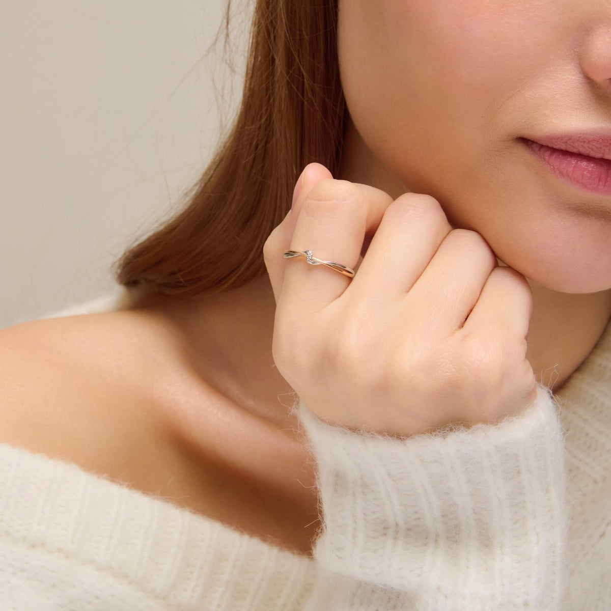 Mother and daughter eternity ring in silver and rose gold, worn on hand