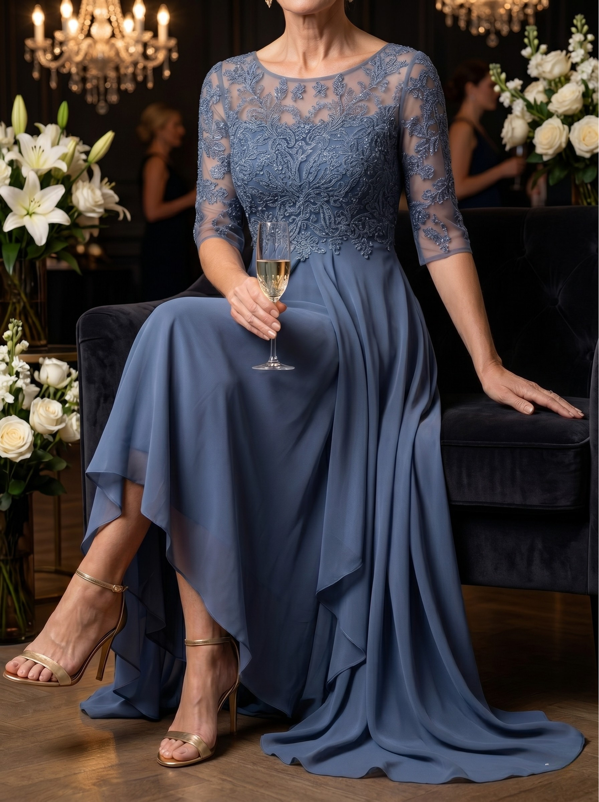 Rhonda lace dress in blue, seated evening view