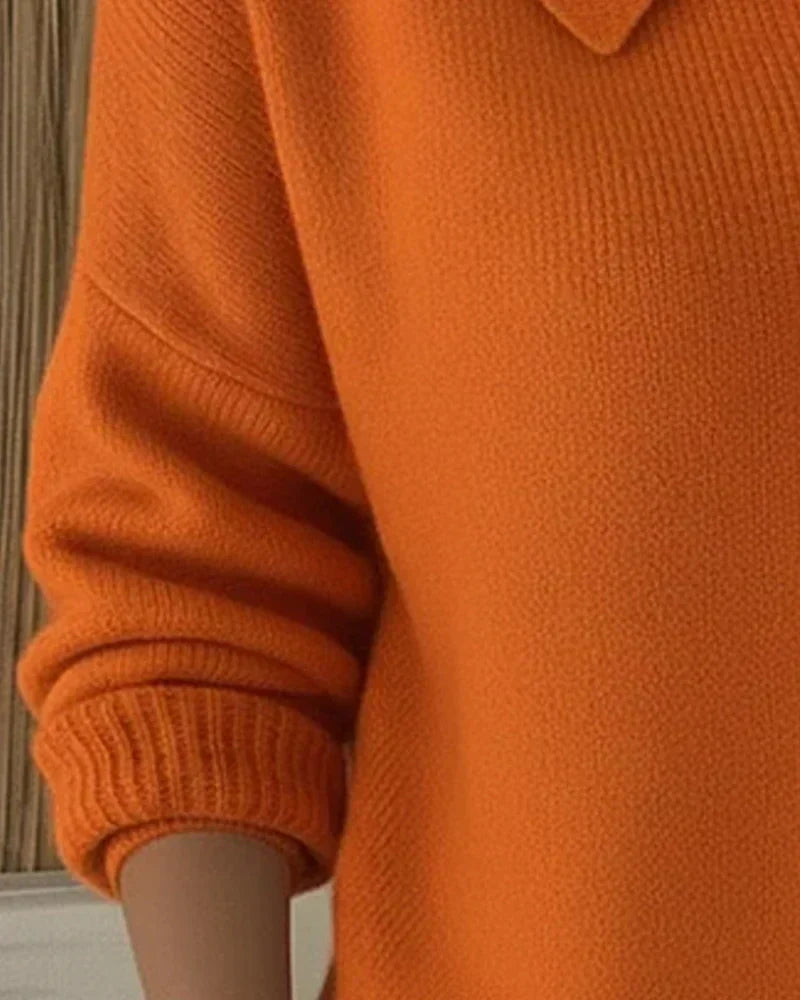 Vega cardigan in orange, close-up of knit texture and cuff