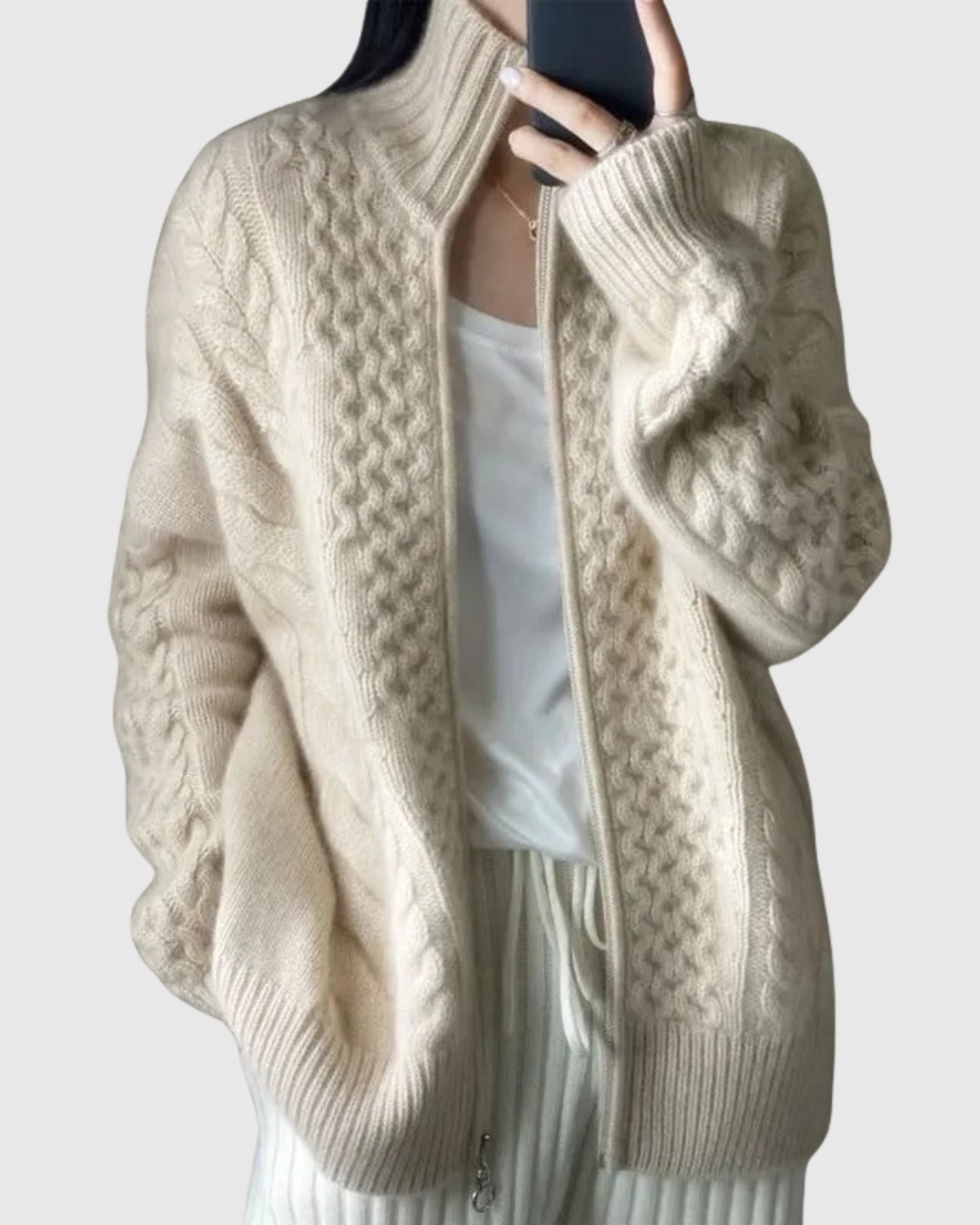 Evarine cable-knit cardigan in cream, front view worn open