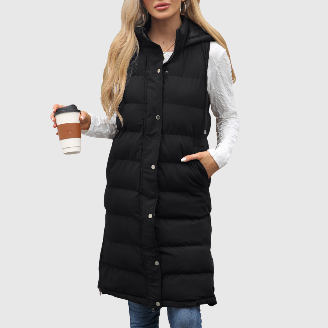 Lifia longline hooded vest in black, front view with hand in pocket
