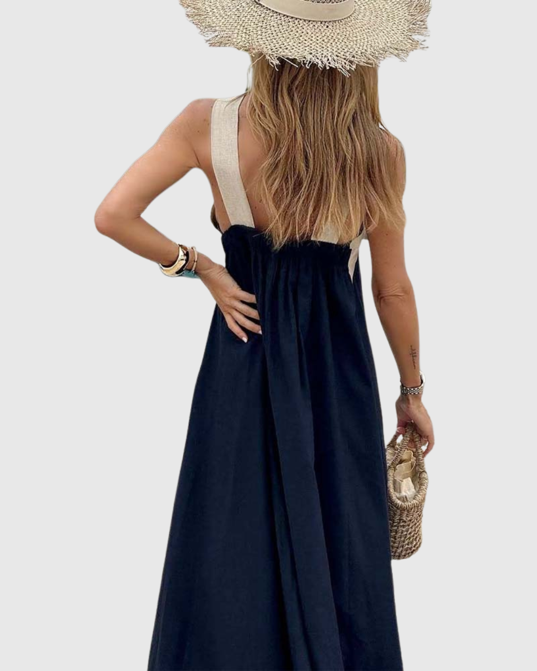 Orella cross-neck dress in black, back view showing gathered open back