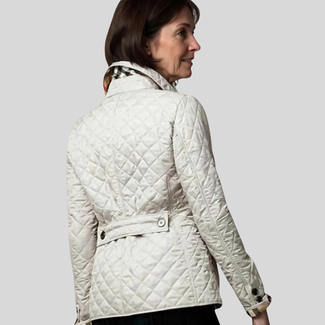Hailey quilted jacket in white, back view showing button waist tab
