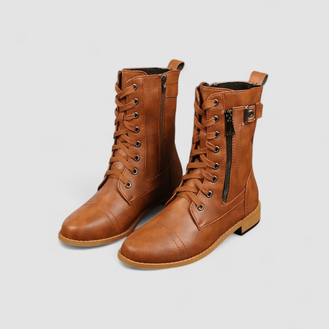 Tallulah buckled western boots in brown, pair on plain background
