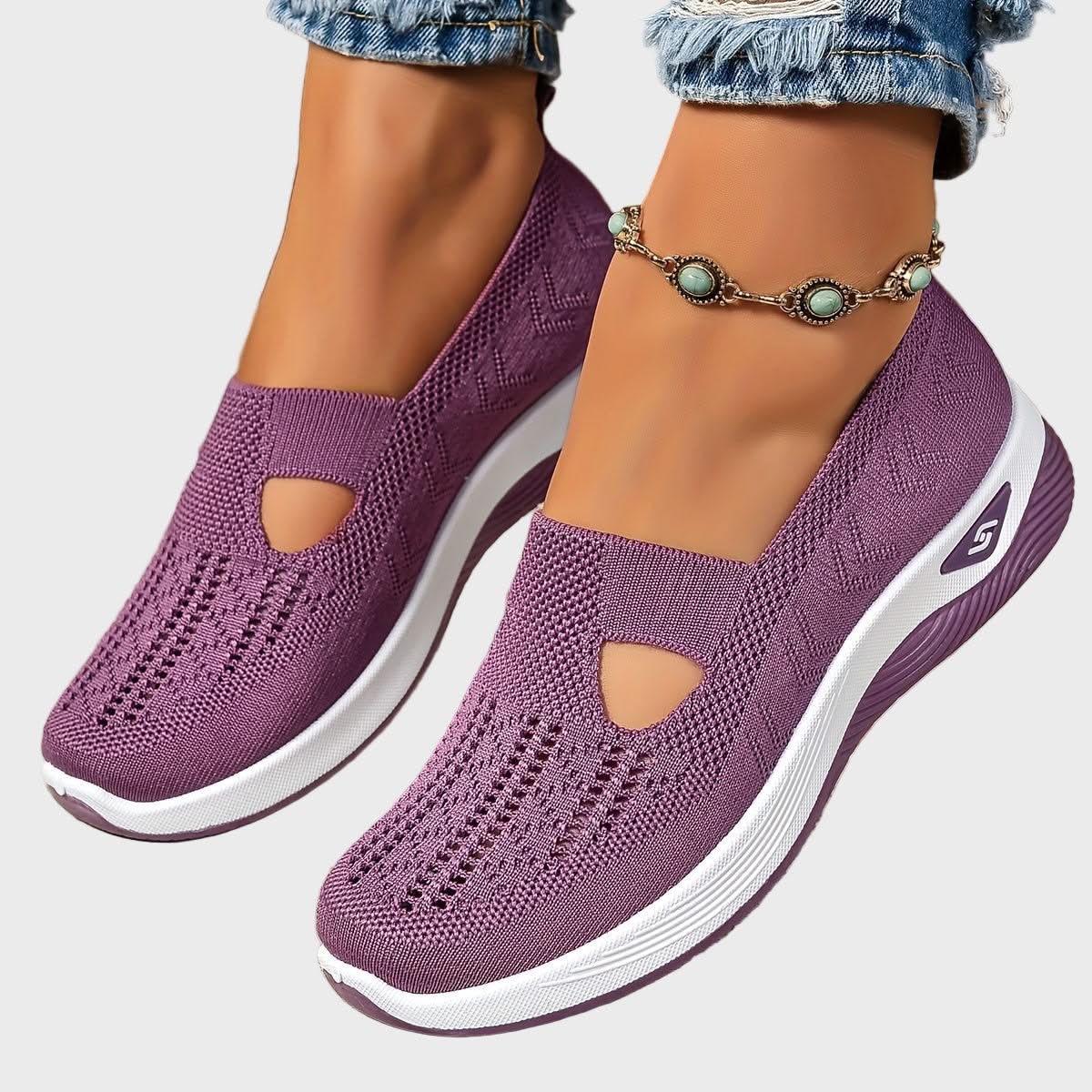 Elara slip-on sneakers in violet, front view on model