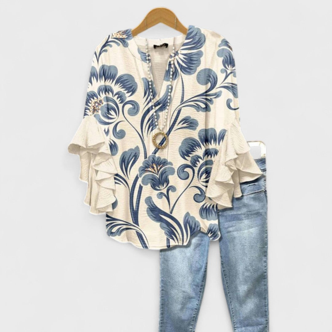 Seliore lightweight day blouse in cream with blue floral print, front view