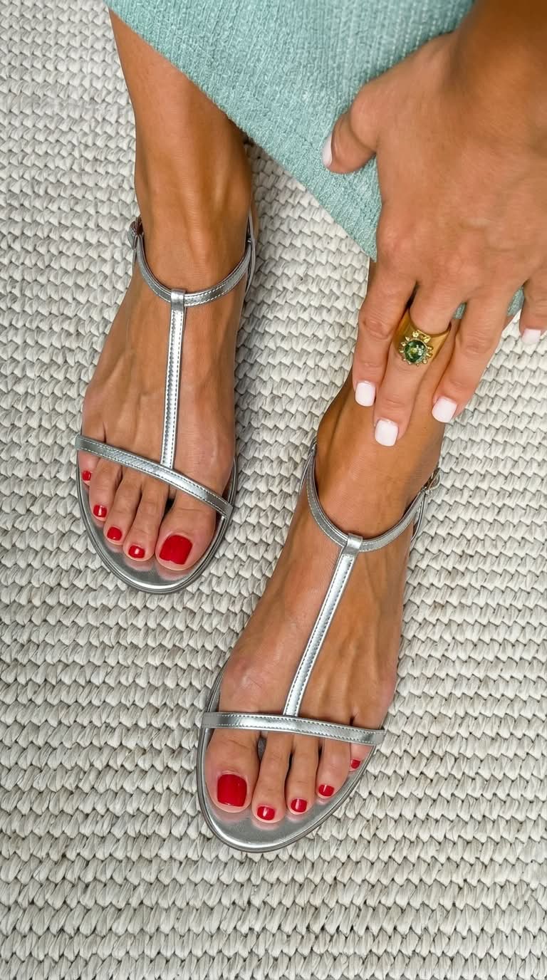 Elara flat T-bar sandals in silver, worn top view