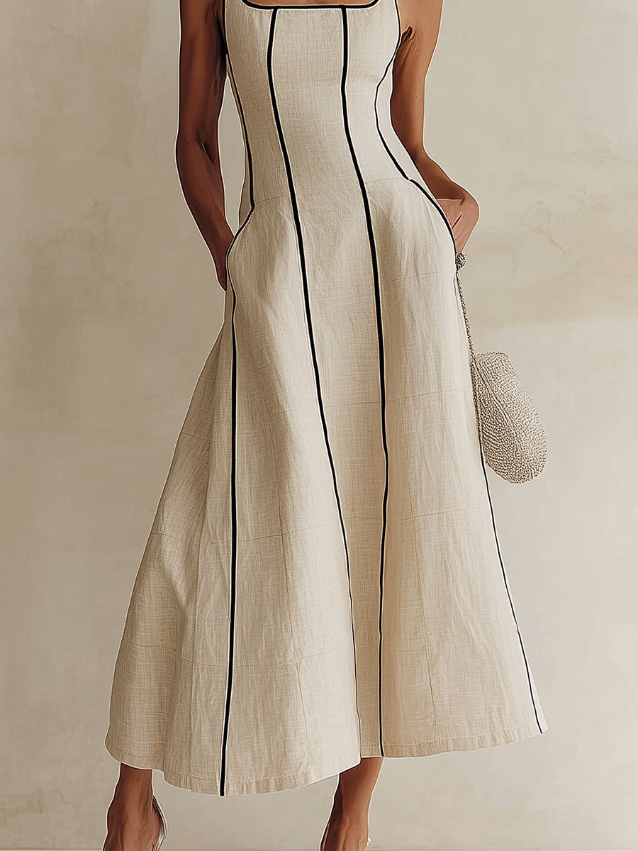 Camille maxi dress in off white, close view of skirt seams and pockets