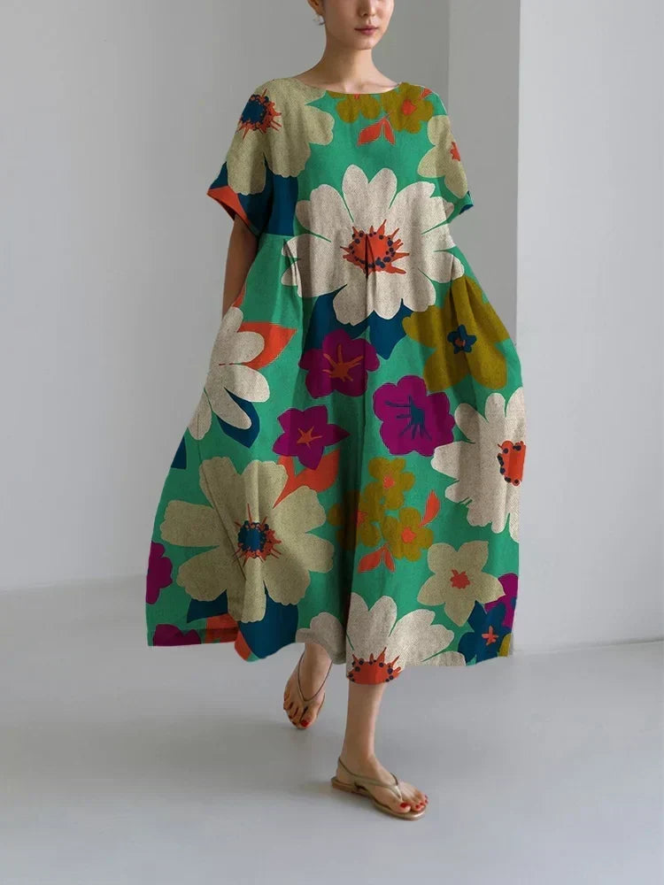 Cecily floral summer dress in green, full-length front view on model