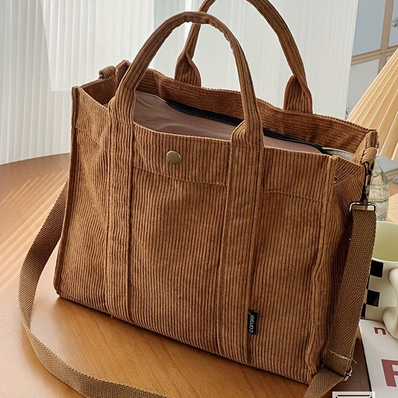 Maribel daily tote bag in rust corduroy, front view on wooden table