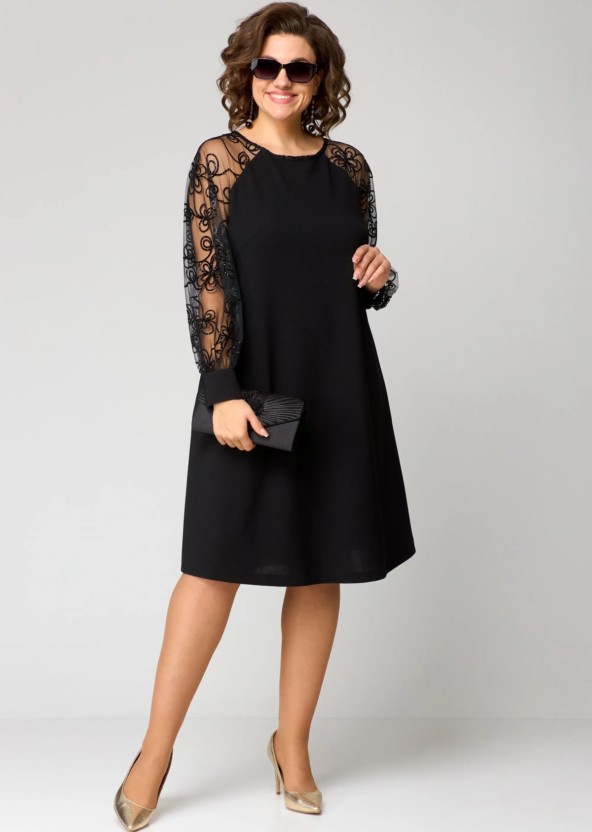 Edris elegant lace dress in black, full-length front view with sheer floral sleeves