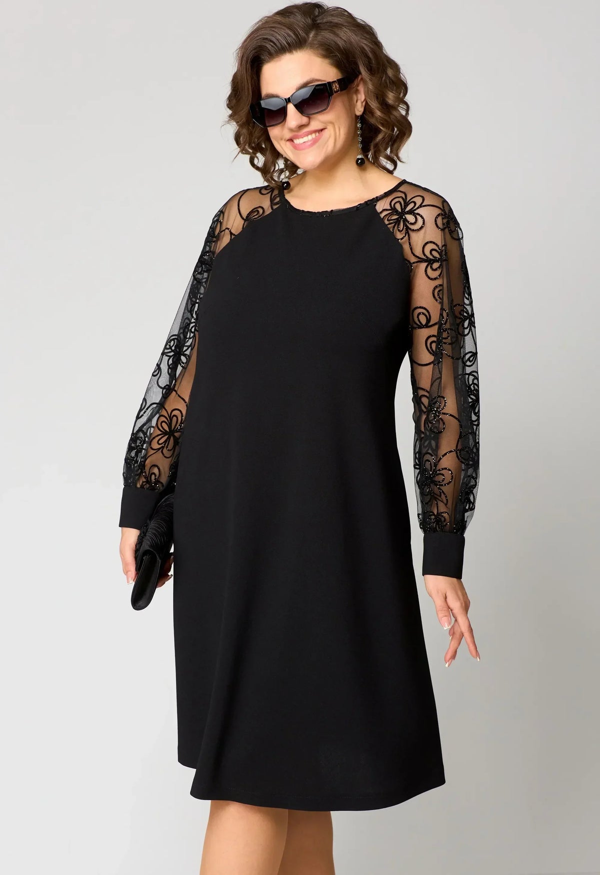 Edris lace dress in black, three-quarter front view showing embroidered mesh sleeves