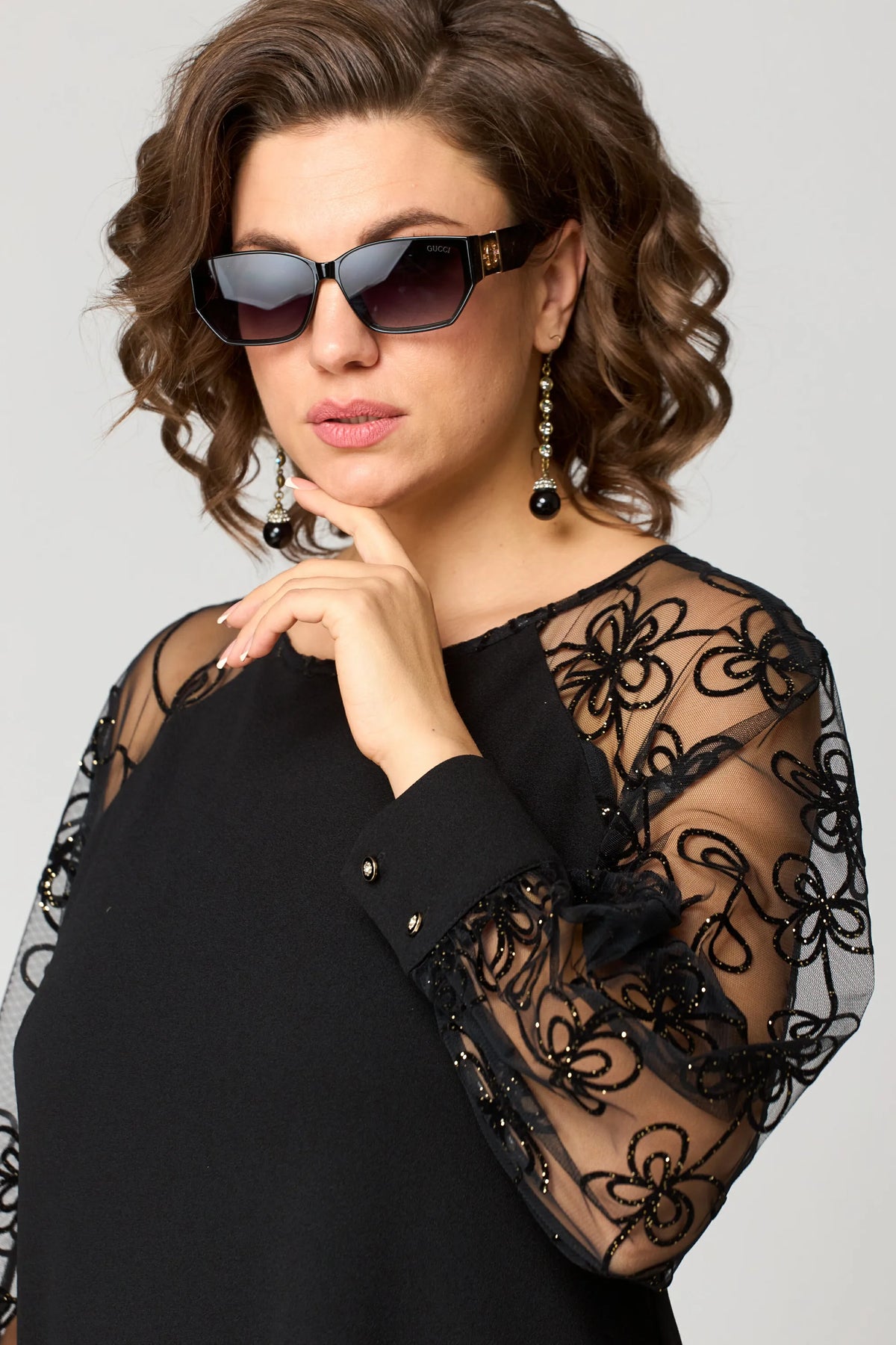 Edris lace dress in black, close-up of embroidered sleeve and buttoned cuff