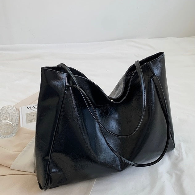 Odessa retro bag in black, product view showing slim straps