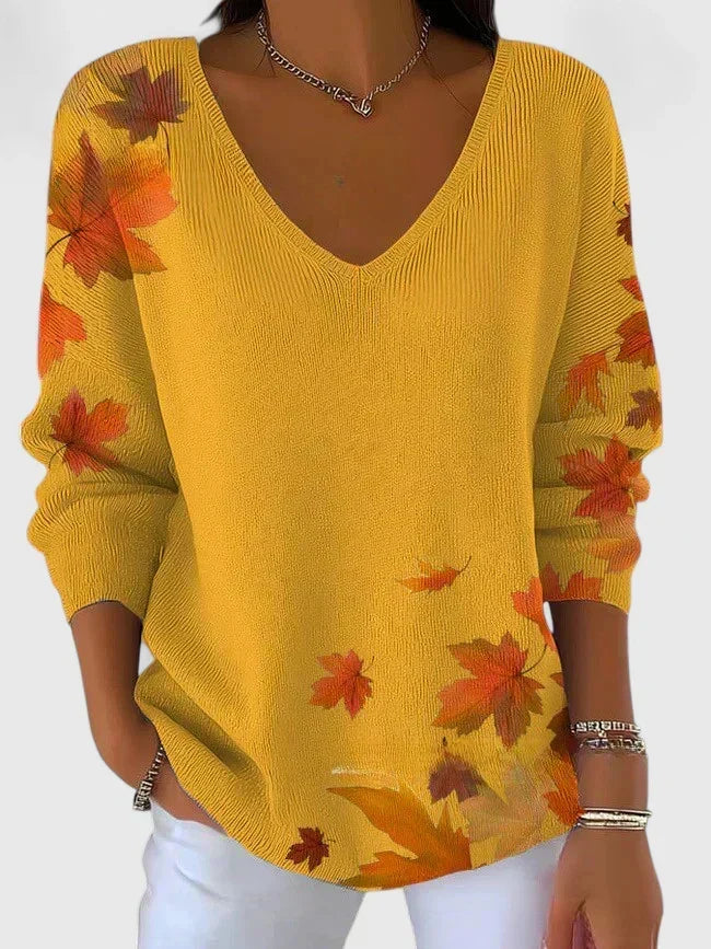 Sera V-neck sweater in yellow with maple leaf print, front view