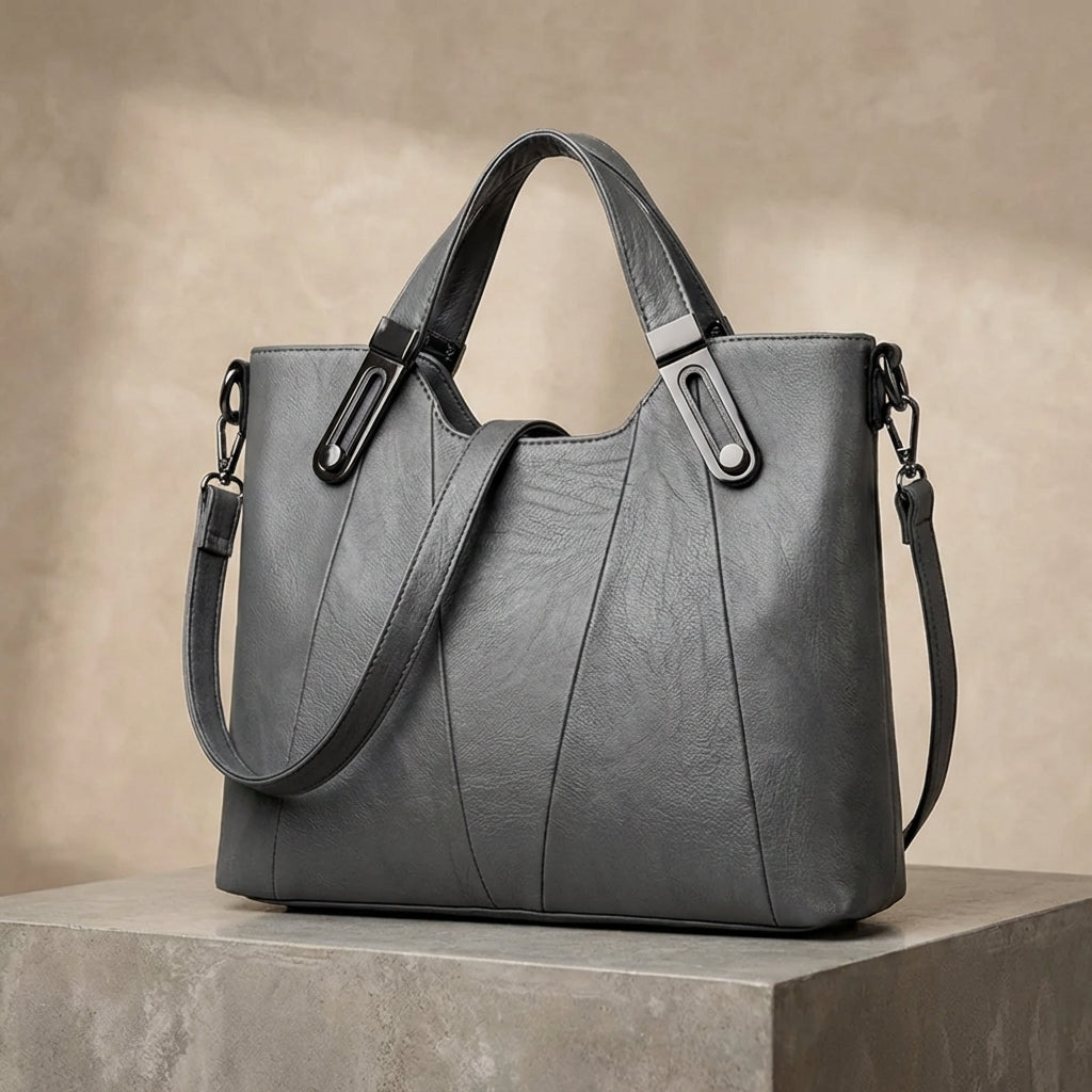 Sienna structured handbag in grey, three-quarter view