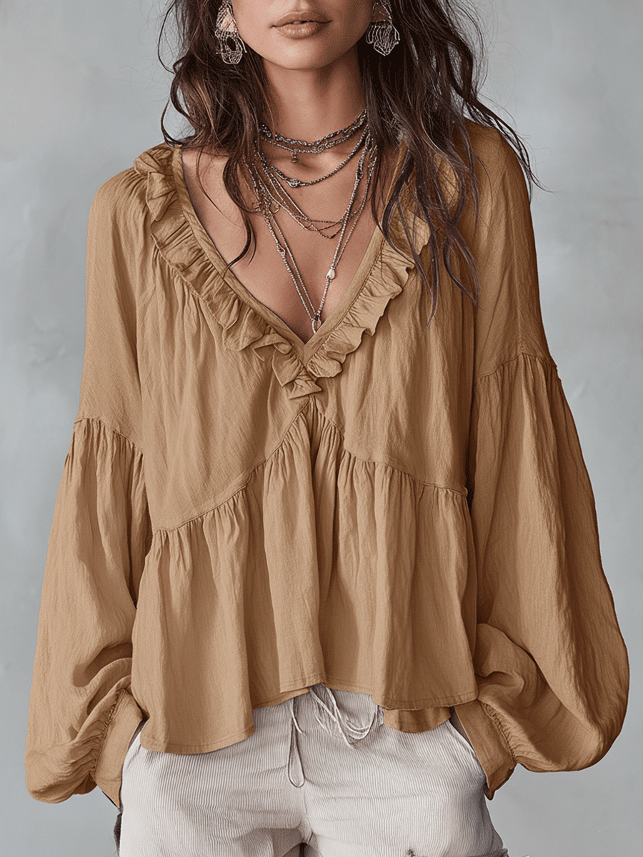 Vintage-inspired bohemian blouse in khaki, front view on model