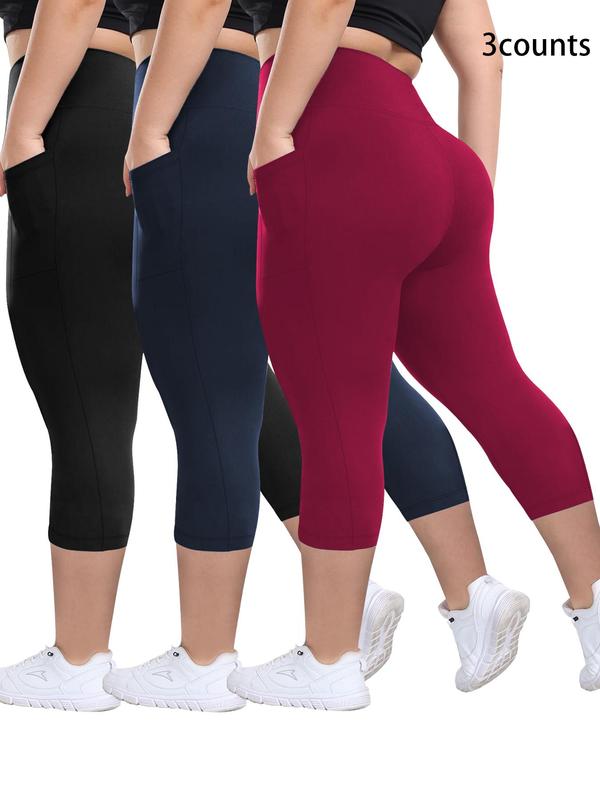 Zinnia capri leggings in black, navy and red, back view