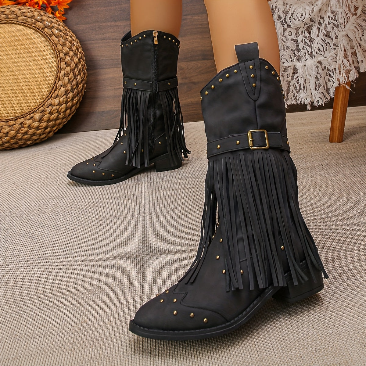 Aurelia western boots in black, three-quarter view with pointed toe