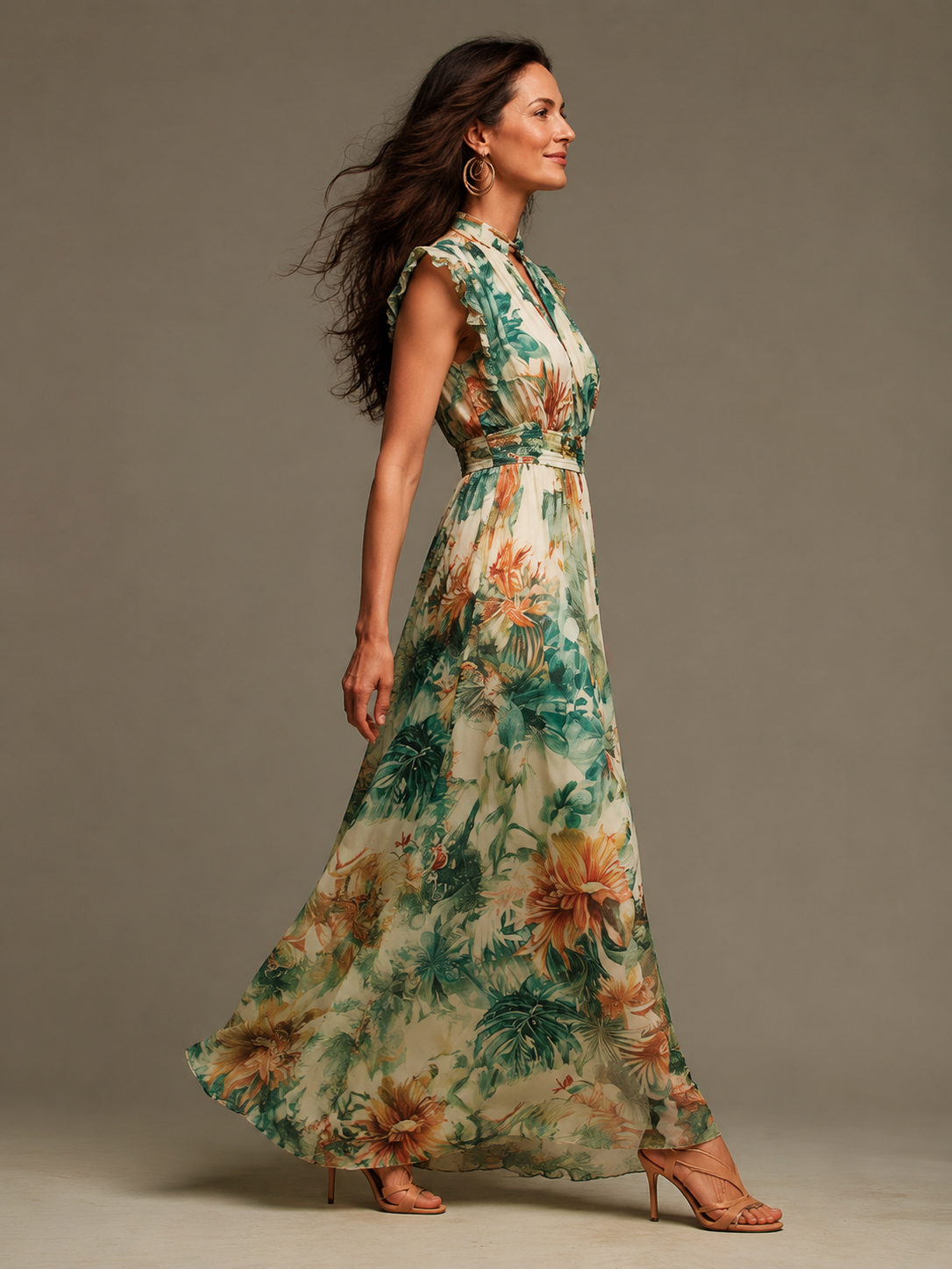 Penelope tropical maxi dress in cream and green print, side view showing flowing skirt