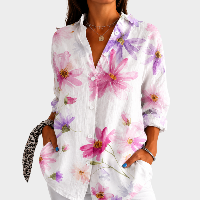 Delicate floral blouse in white with pink and lilac watercolour print, front view