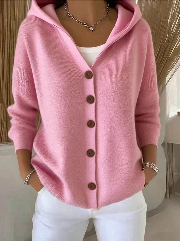 Rocío hooded knit cardigan in pink, front view worn open over white top