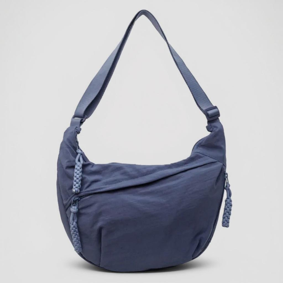 Imogen shoulder bag in blue, front view with braided zip pulls
