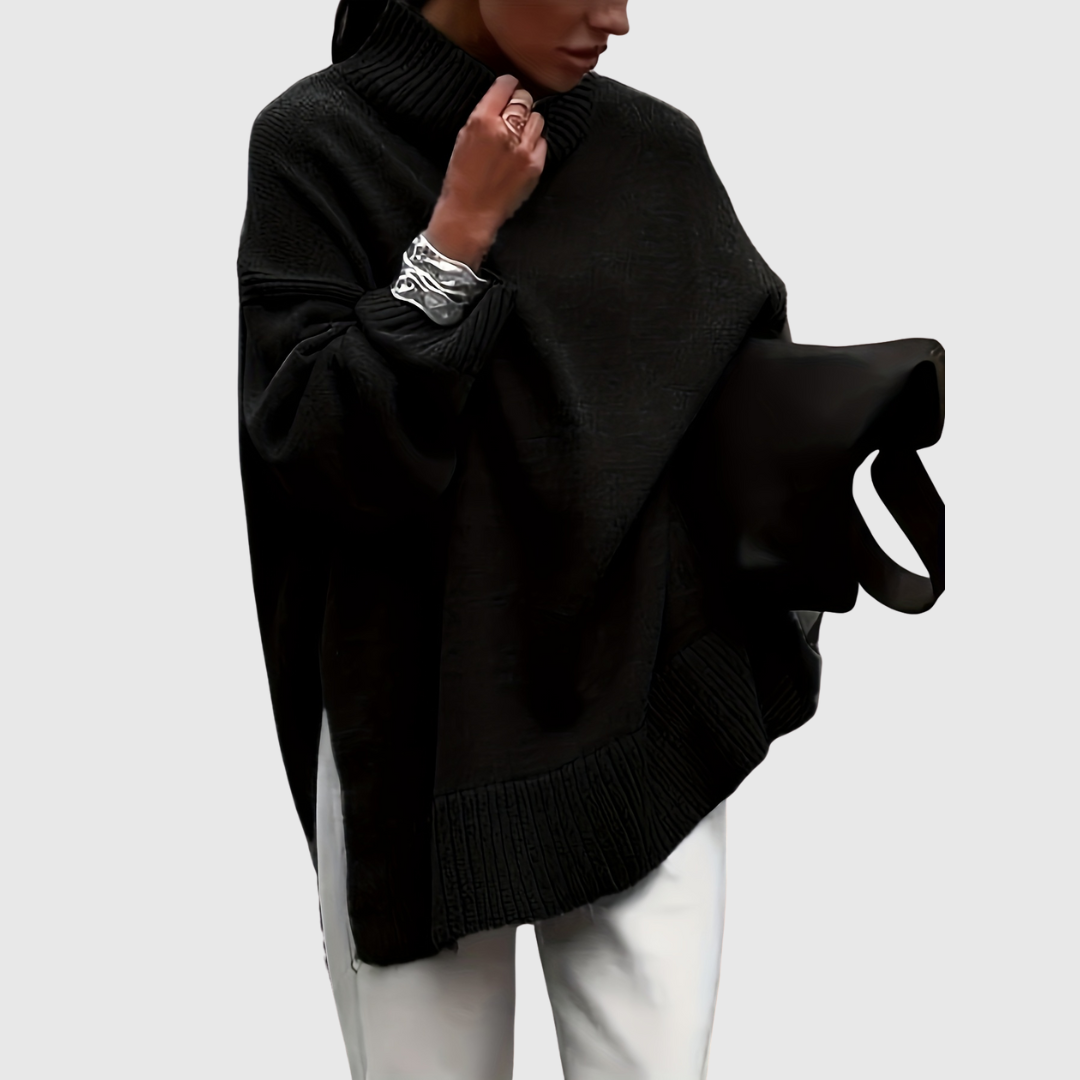 Victoria's oversized sweater in black, front view with ribbed collar