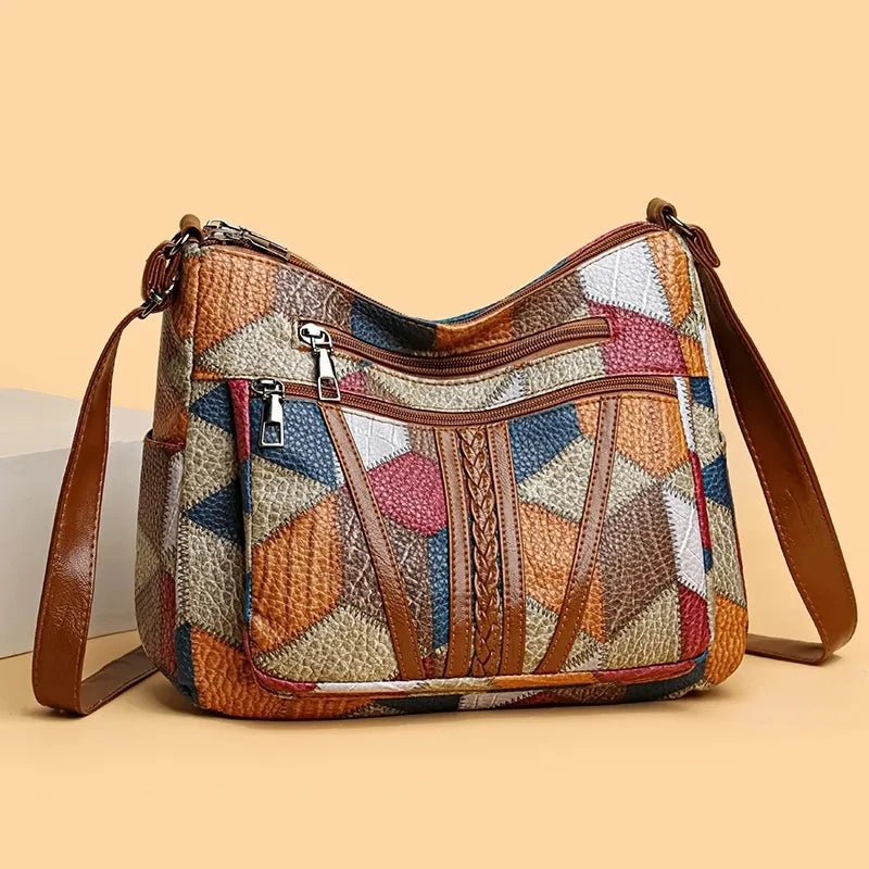 Multicolour patchwork handbag with zip pockets, front view