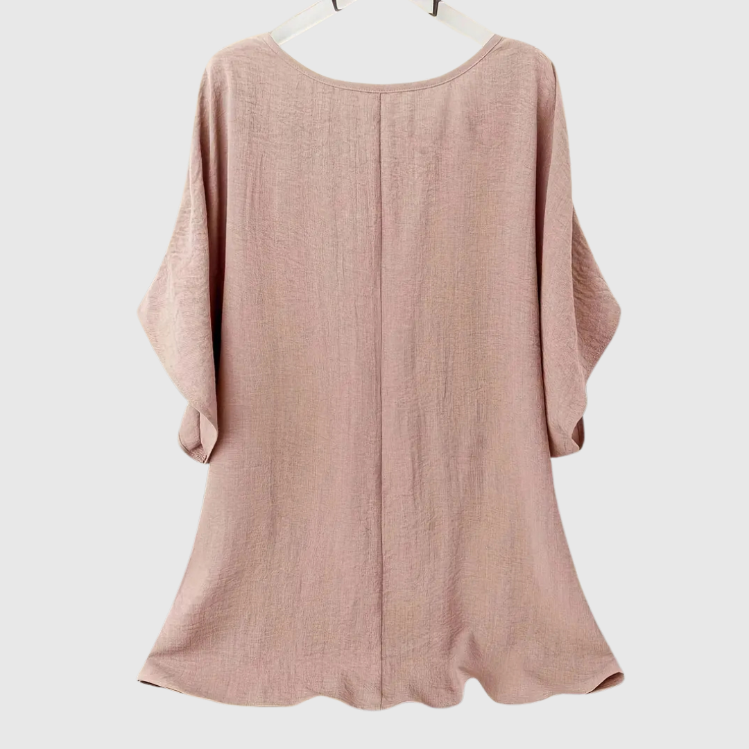 Ardina casual comfort blouse in pink, back view showing curved hem