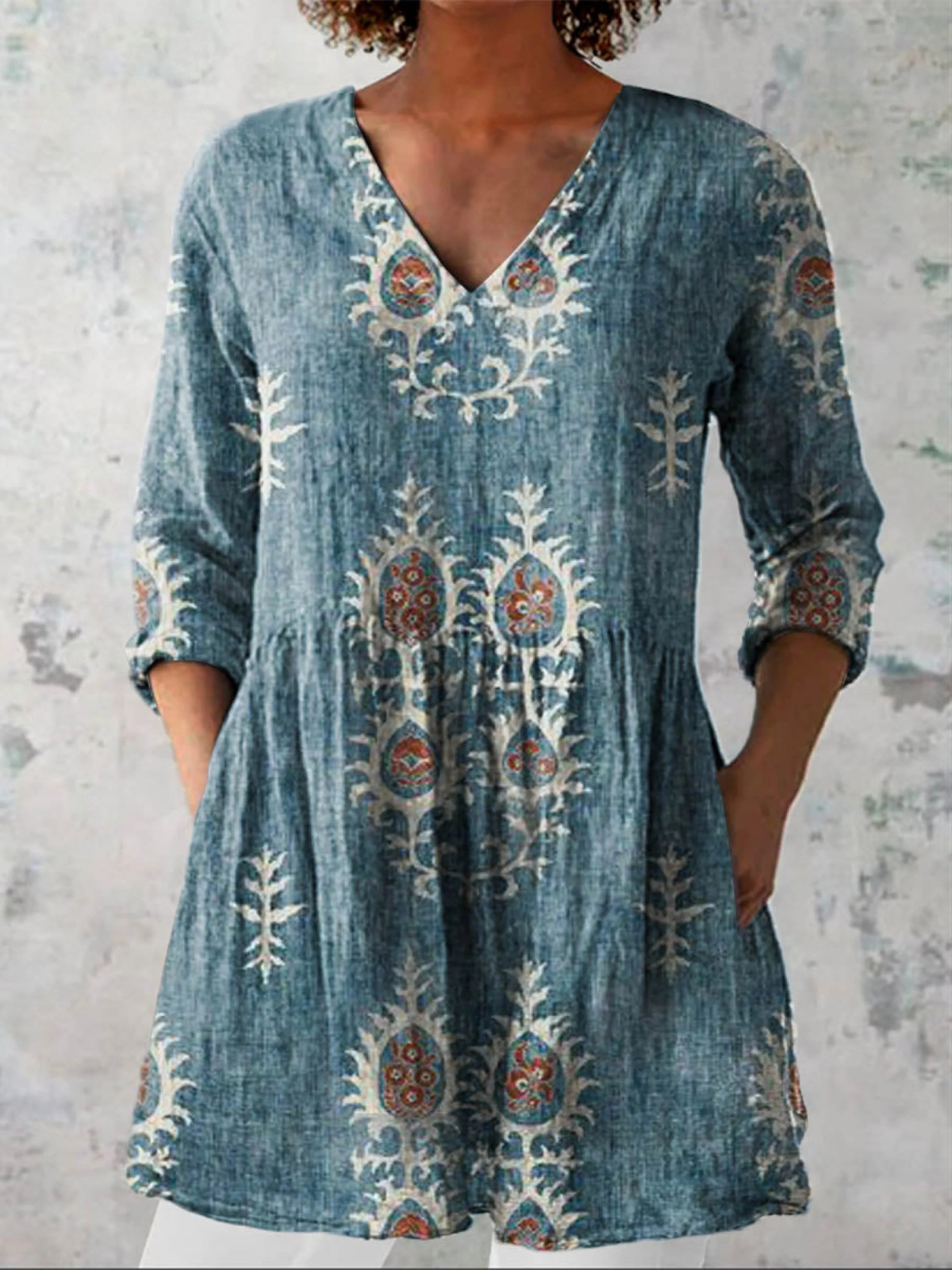 Elise long V-neck blouse in blue with folk floral print, front view