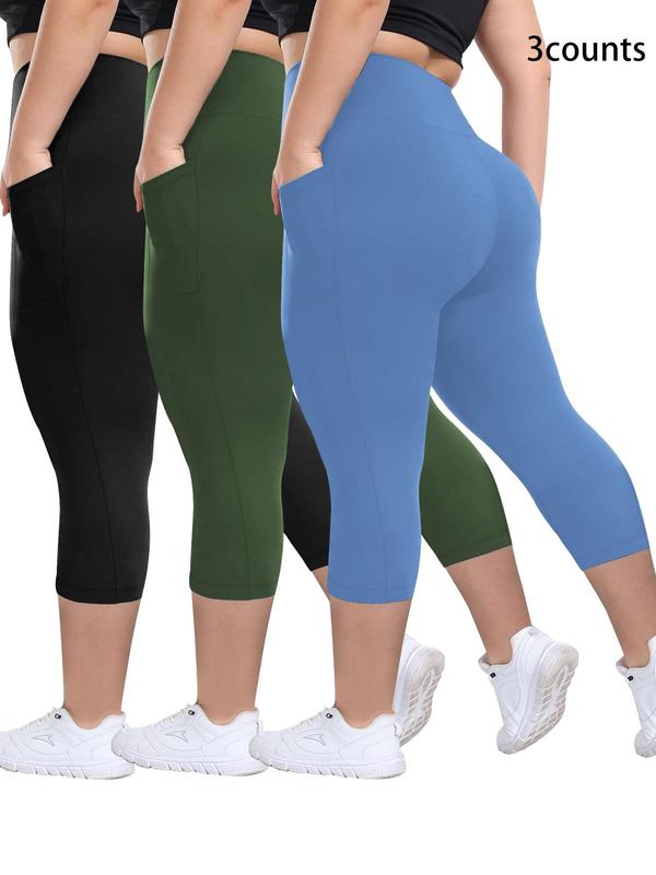 Zinnia capri leggings in black, green and light blue, back view with side pockets