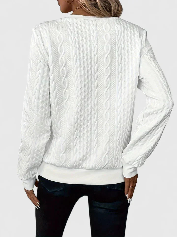 Ara sweater in white, back view of textured knit and sleeves