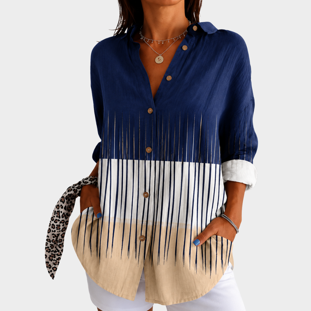 Harbour white and blue colour-block blouse worn with white shorts, front view