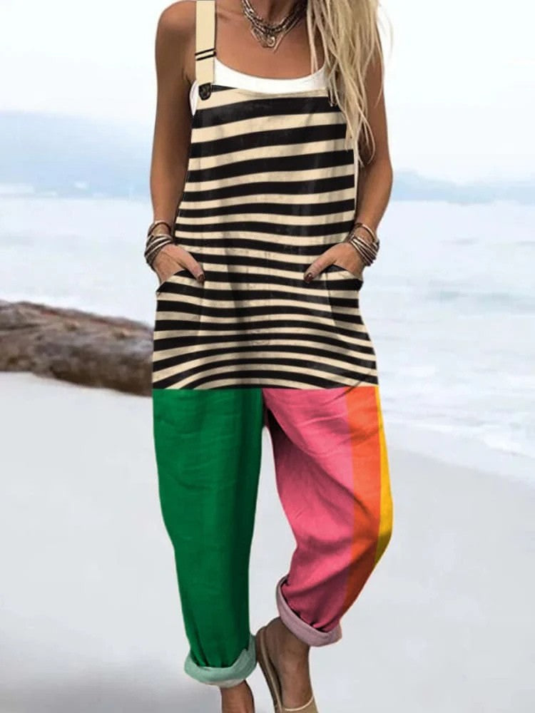 Striped colour-block jumpsuit with green, pink and orange legs, full-length front view