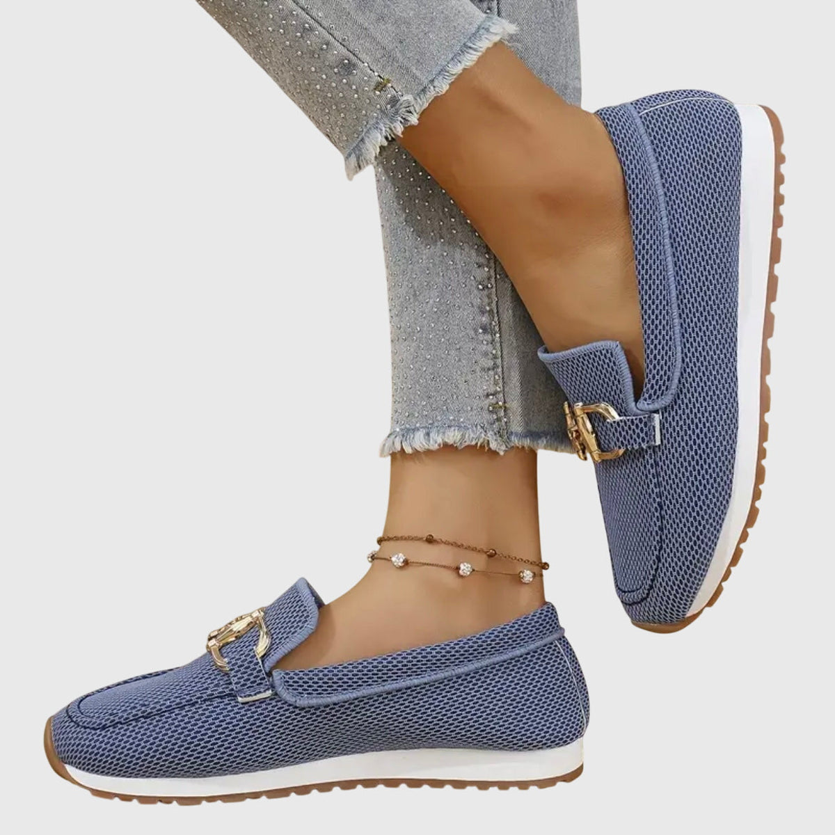 Winifred loafers in blue, side view showing ridged rubber sole