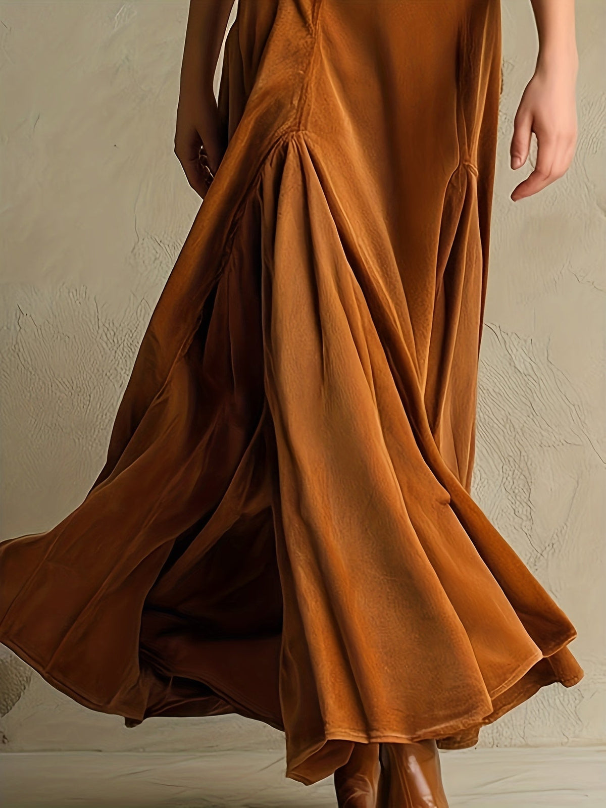Elowenna maxi dress in caramel brown, close-up of gathered flared skirt