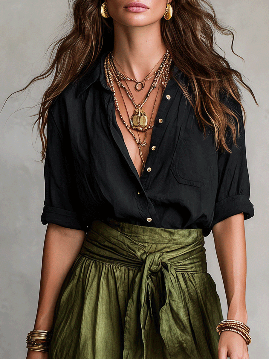 Close-up of the olive green skirt's gathered tie waist with black shirt