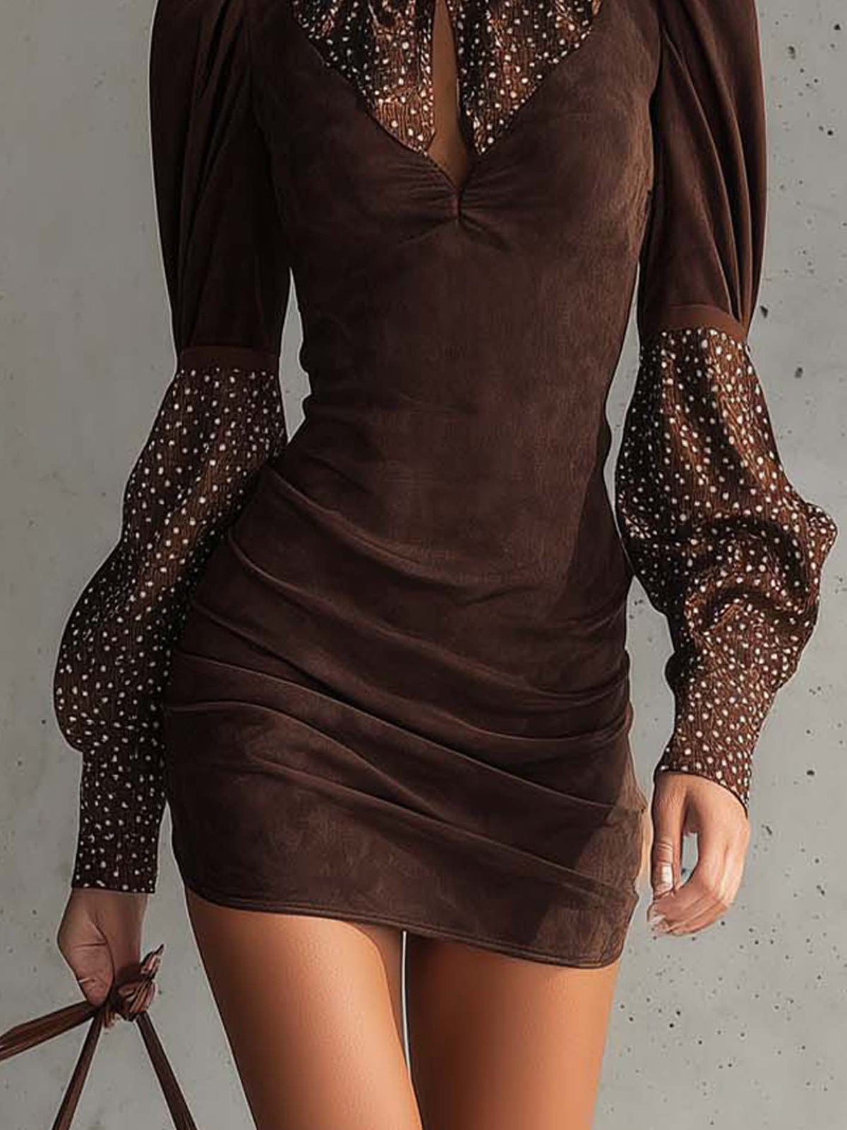 Paully dress in brown, detail of ruched draping and dotted sheer sleeves