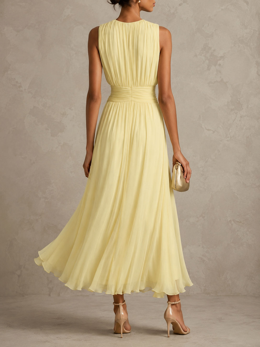 Chayna sleeveless maxi dress in yellow, back view showing gathered bodice