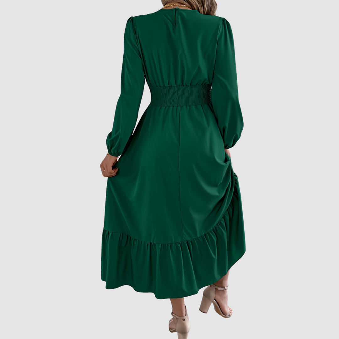 Isola Lane midi dress in dark green, back view showing ruffled hem
