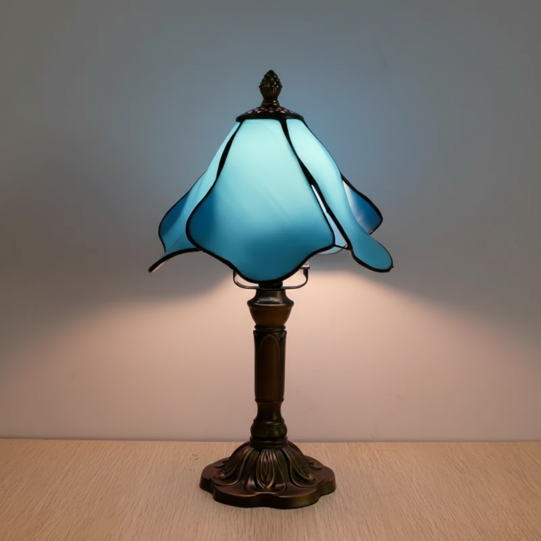 Blue Fairy stained-glass table lamp with petal shade and bronze-toned base