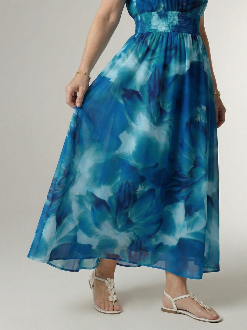 Sylin dress in blue, close-up of shirred waistband and skirt